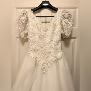 Beautiful elegant wedding dress with beading and flower design